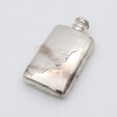 Lot 235 - An early 20th century silver hip flask, of...
