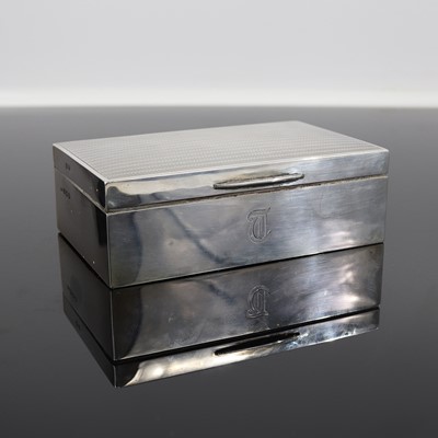 Lot 353 - An Art Deco silver table cigarette box, the...