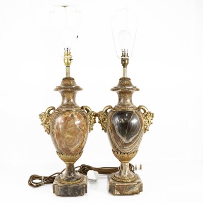 Lot 135 - A pair of onyx and gilt bronze mounted...
