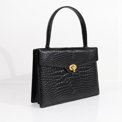 Lot 401 - Asprey & Garrard, a black patent...