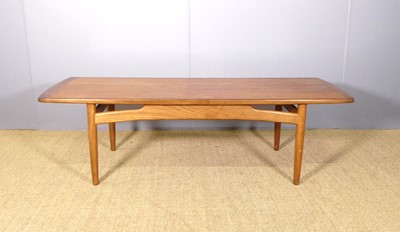 Lot 474 - G-Plan - a 1960s teak low coffee table, having...