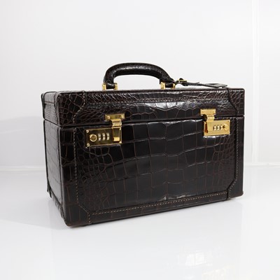Lot 404 - Asprey, a brown crocodile leather dressing...