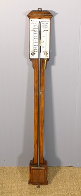 Lot 209 - A Negretti & Zambra polished oak farmer's...