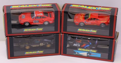 Lot 236 - Collection of 4 various boxed Scalextric to...