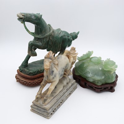 Lot 28 - A contemporary Chinese carved hardstone figure...