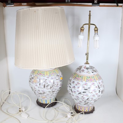 Lot 36 - A pair of Chinese porcelain twin-branch table...