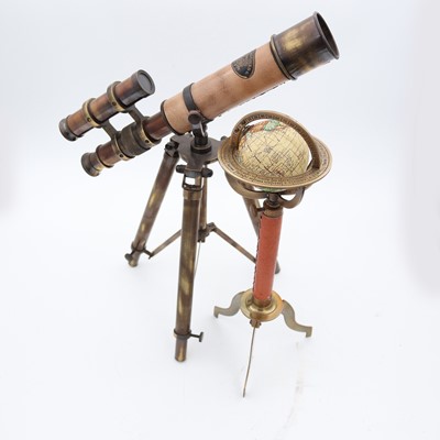 Lot 47 - A reproduction tabletop globe, on tripod stand...