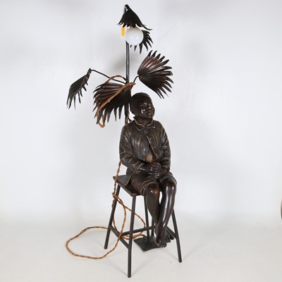 Lot 48 - A contemporary bronzed composite table lamp in...