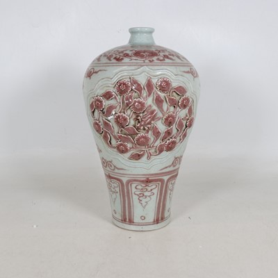Lot 63 - A reproduction porcelain Mei Ping, relief...