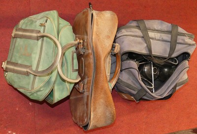 Lot 566 - Three sets of four bowling woods, in bags with...