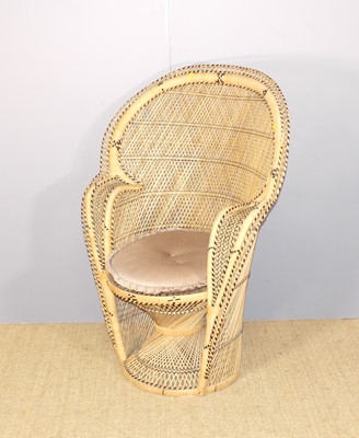 Lot 675 - A contemporary wicker 'Peacock' chair, with...
