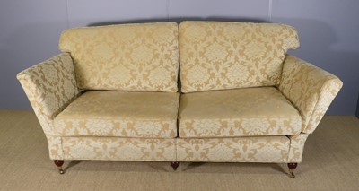 Lot 681 - A contemporary floral fabric upholstered three-...