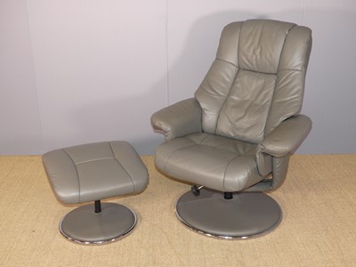Lot 687 - A contemporary grey leather upholstered and...