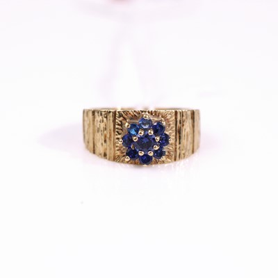 Lot 315 - A modern 9ct gold and synthetic sapphire set...