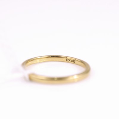 Lot 318 - An 18ct gold wedding band, size S, 2.9g