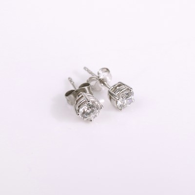 Lot 325 - A pair of platinum and lab-grown diamond set...