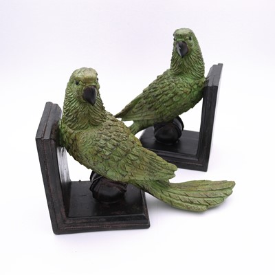 Lot 109 - A pair of painted composite bookends modelled...