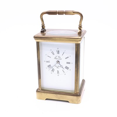 Lot 117 - A French lacquered brass carriage clock, the...