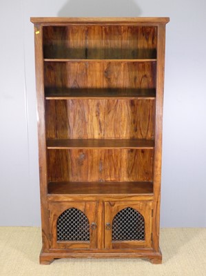 Lot 699 - A contemporary Eastern hardwood freestanding...