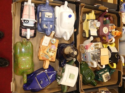 Lot 136 - A collection of novelty teapots, to include...