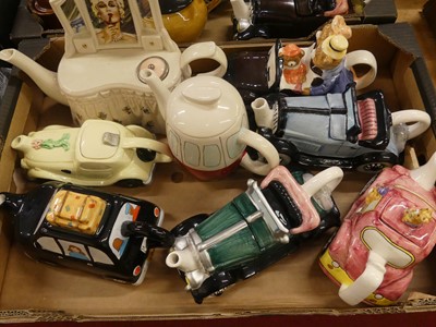 Lot 137 - A collection of novelty teapots, to include...