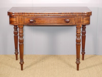 Lot 705 - A Regency mahogany D-shaped fold-over tea...