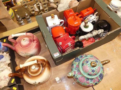 Lot 149 - A collection of novelty teapots, to include...