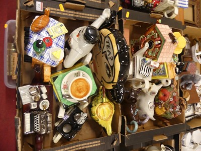 Lot 152 - A collection of novelty teapots, to include an...