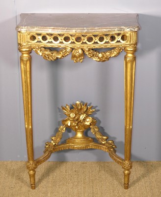 Lot 582 - A French giltwood compact console table, in...