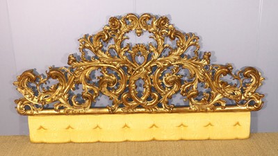 Lot 584 - An elaborate pierced floral giltwood decroated...