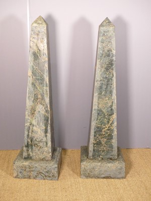 Lot 585 - A pair of veined verdigris marble pedestal...