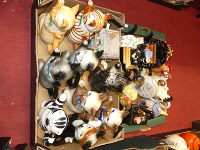 Lot 165 - A collection of novelty teapots, to include...