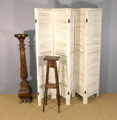 Lot 586 - A white-washed six-division folding screen, of...