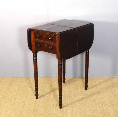 Lot 734 - A Regency mahogany drop flap two-drawer work...
