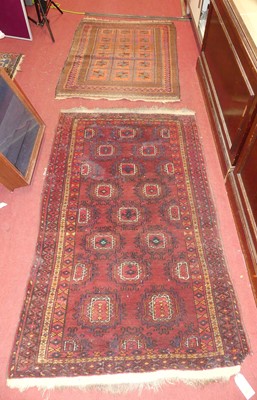 Lot 743 - Two similar Persian woollen red ground Bokhara...