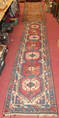 Lot 744 - A Turkish woollen red, blue and cream ground...