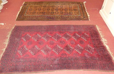 Lot 745 - A Persian woollen brown ground Bokhara rug,...