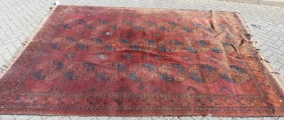 Lot 749 - A large Persian woollen red and blue ground...
