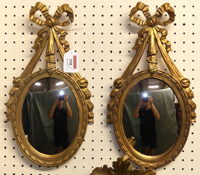 Lot 598 - A pair of small gilt composite French-style...