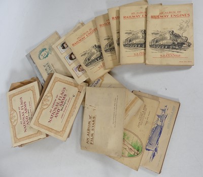 Lot 199 - A collection of albums of cigarette cards, to...
