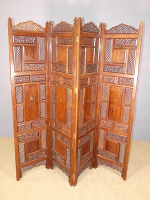 Lot 601 - An Indonesian teak, brass inlaid and further...