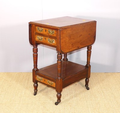 Lot 613 - A late Victorian walnut drop flap work table,...
