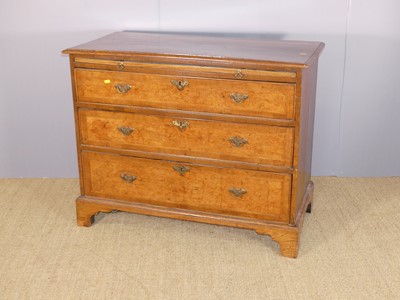 Lot 618 - An oak feather and crossbanded chest, having...