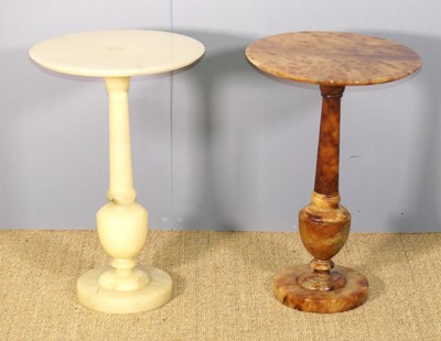 Lot 620 - Two contemporary turned onyx circular pedestal...