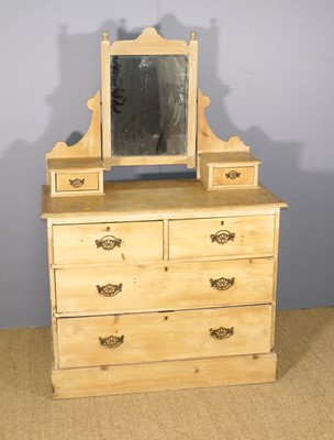 Lot 628 - An Edwardian pine mirror-back dressing chest,...