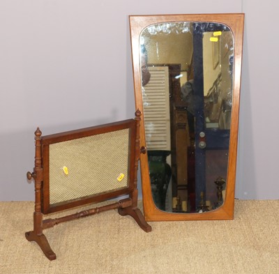 Lot 657 - A 1970s teak framed angular wall mirror, 70 x...