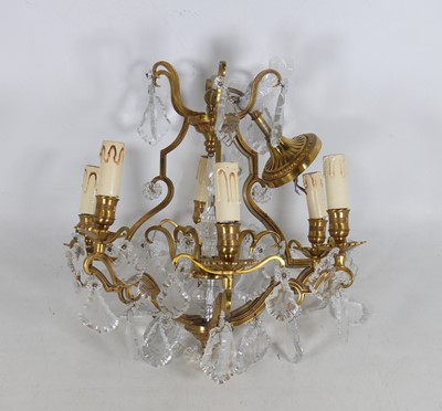 Lot 662 - A French gilt metal scroll decroated six light...