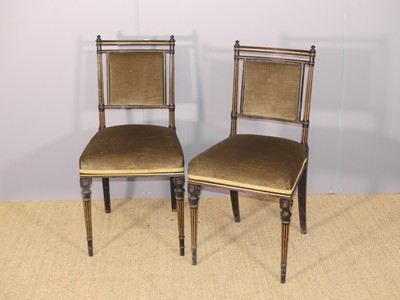 Lot 670 - A pair of Aesthetic Movement ebonised and gilt...