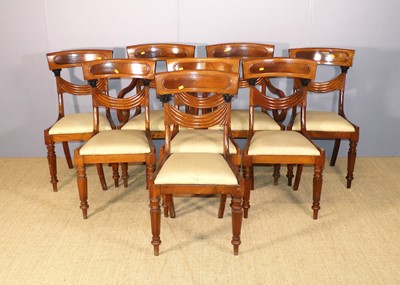 Lot 674 - A set of eight Regency-style mahogany barback...