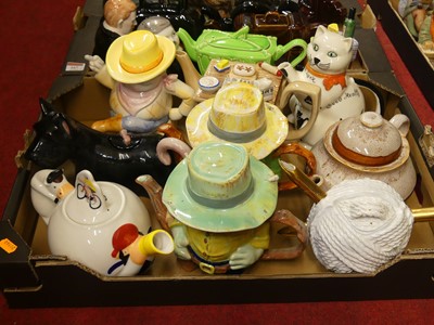 Lot 167 - A collection of novelty teapots, to include an...